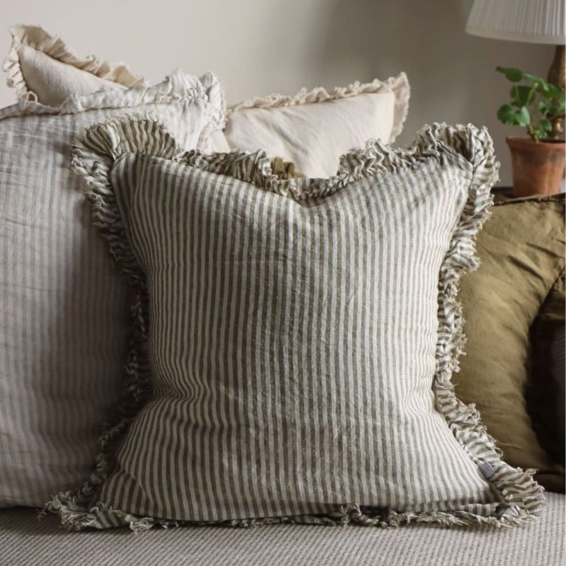 Hallie Olive Stripe Stonewashed Linen Cushion with ruffled edge detail for a vintage aesthetic