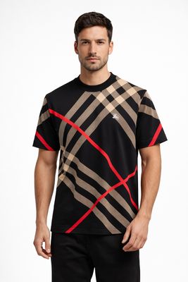 Male model wearing Burberry black check pattern t-shirt with red stripe detail luxury designer men's outfit front view