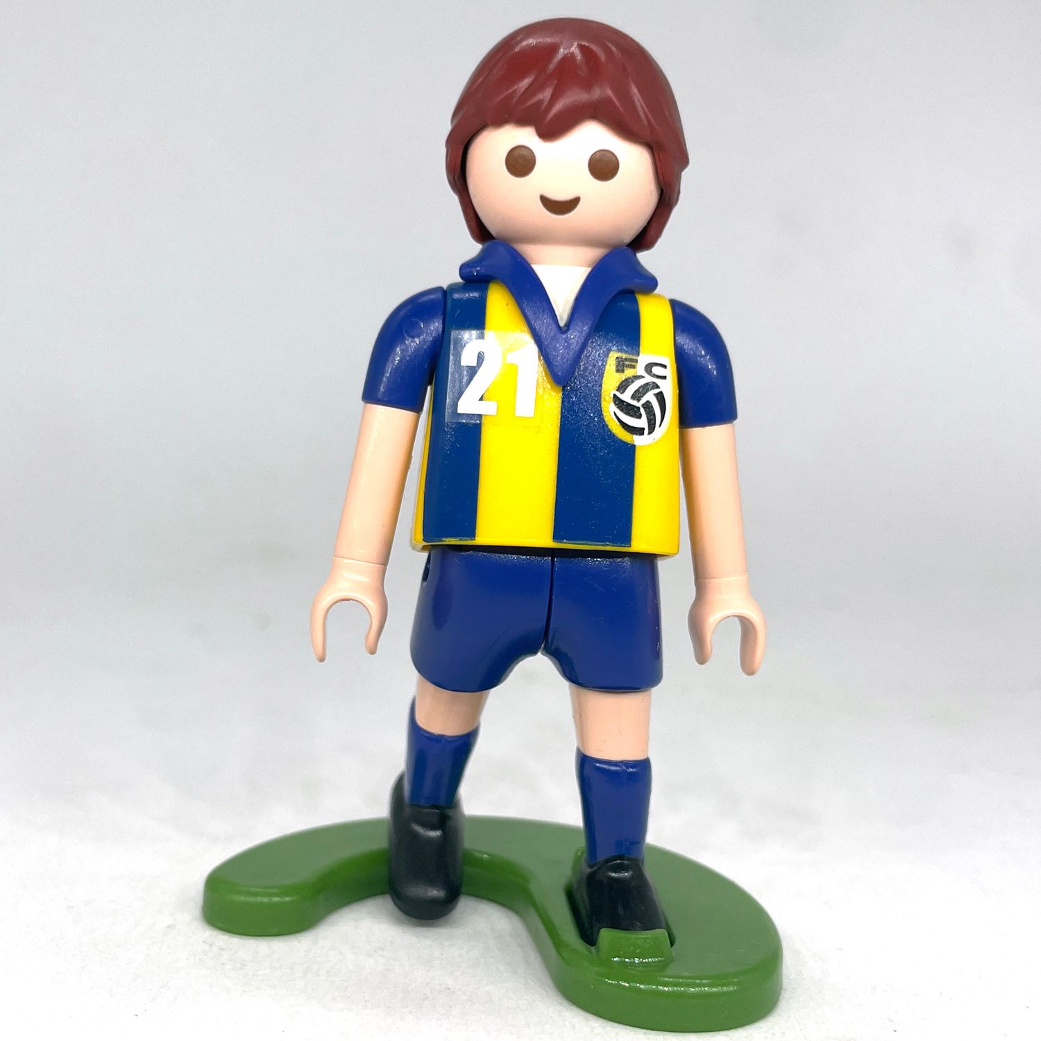playmobil footballeur bleu jaune
