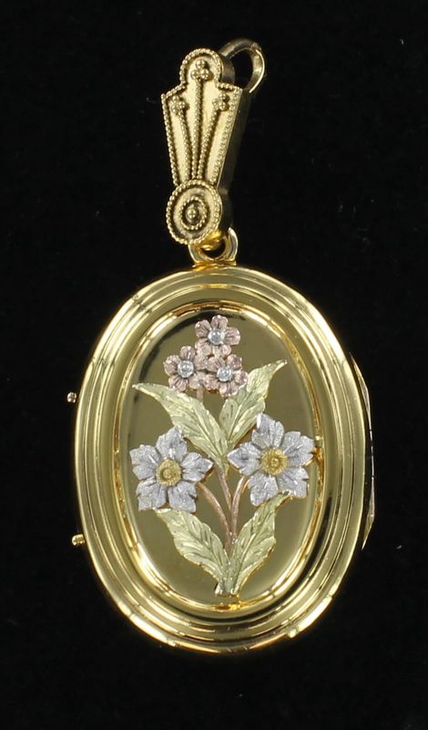 14KTY LOCKET WITH FLOWERS