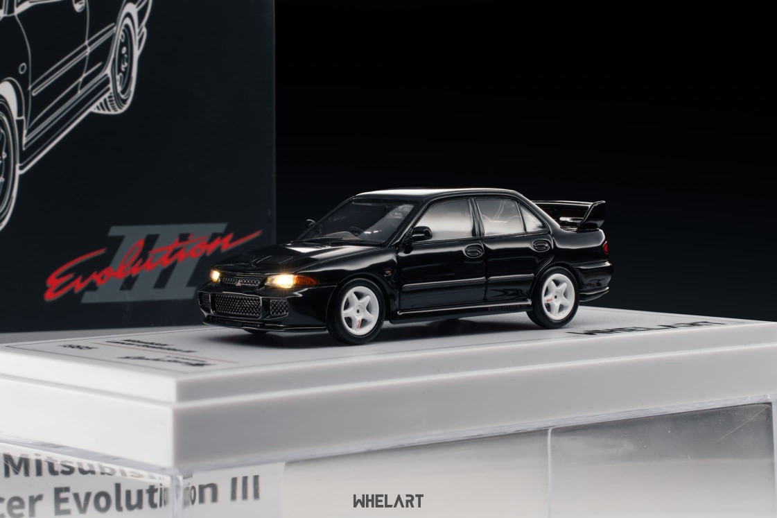 1:64 Whelart - Mitsubishi EVO 3 Light-up, black (Light-up)