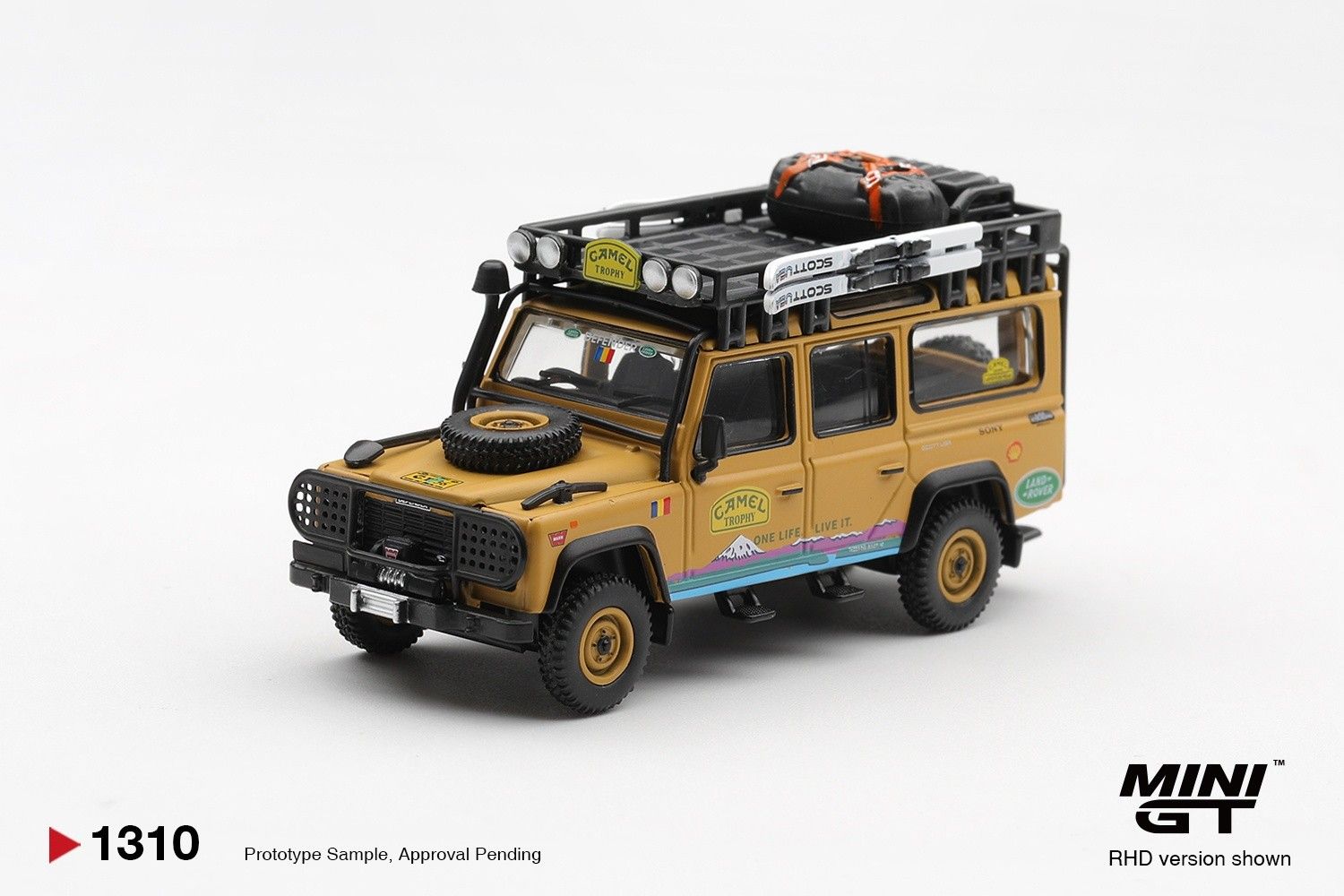 1:64 Mini GT - 1998 Land Rover Defender 110 *Camel Trophy* Team Romania Tierra Del Fuego CT36