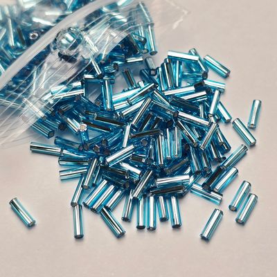 6mm Bugles: #18 Silverlined Light Aqua 6mm Bugles: #18 Silverlined Light Aqua