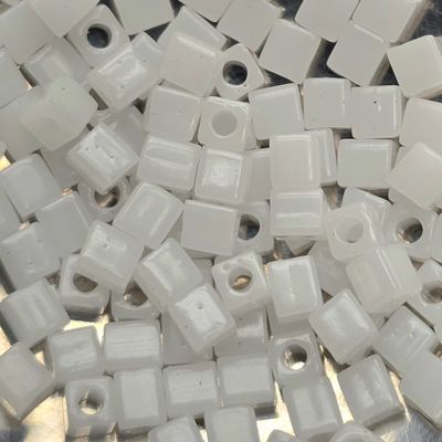 SB4-550: Miyuki White Translucent Luster - 4mm Square/Cube Beads