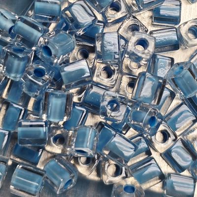 SB4-221: Miyuki Light Blue Lined Crystal - 4mm Square/Cube Beads