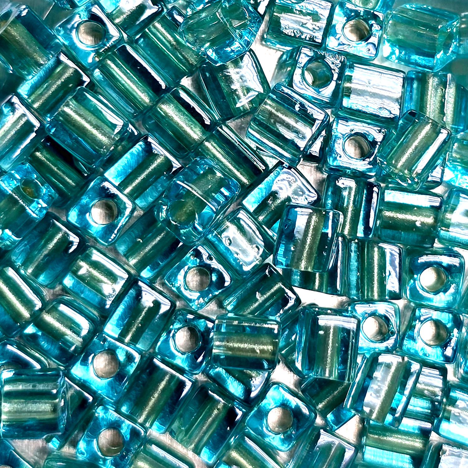 SB4-2638: Miyuki Light Sparkle Celery Lined Auqa Crystal - 4mm Square/Cube Beads