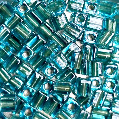 SB4-2638: Miyuki Light Sparkle Celery Lined Auqa Crystal - 4mm Square/Cube Beads