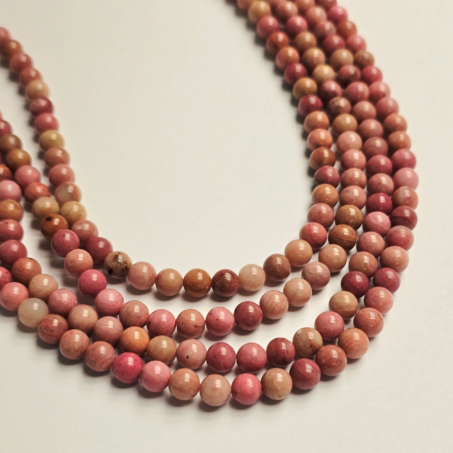 6mm Rounds - Rose Pink Rhodonite 6mm Rounds - Rose Pink Rhodonite