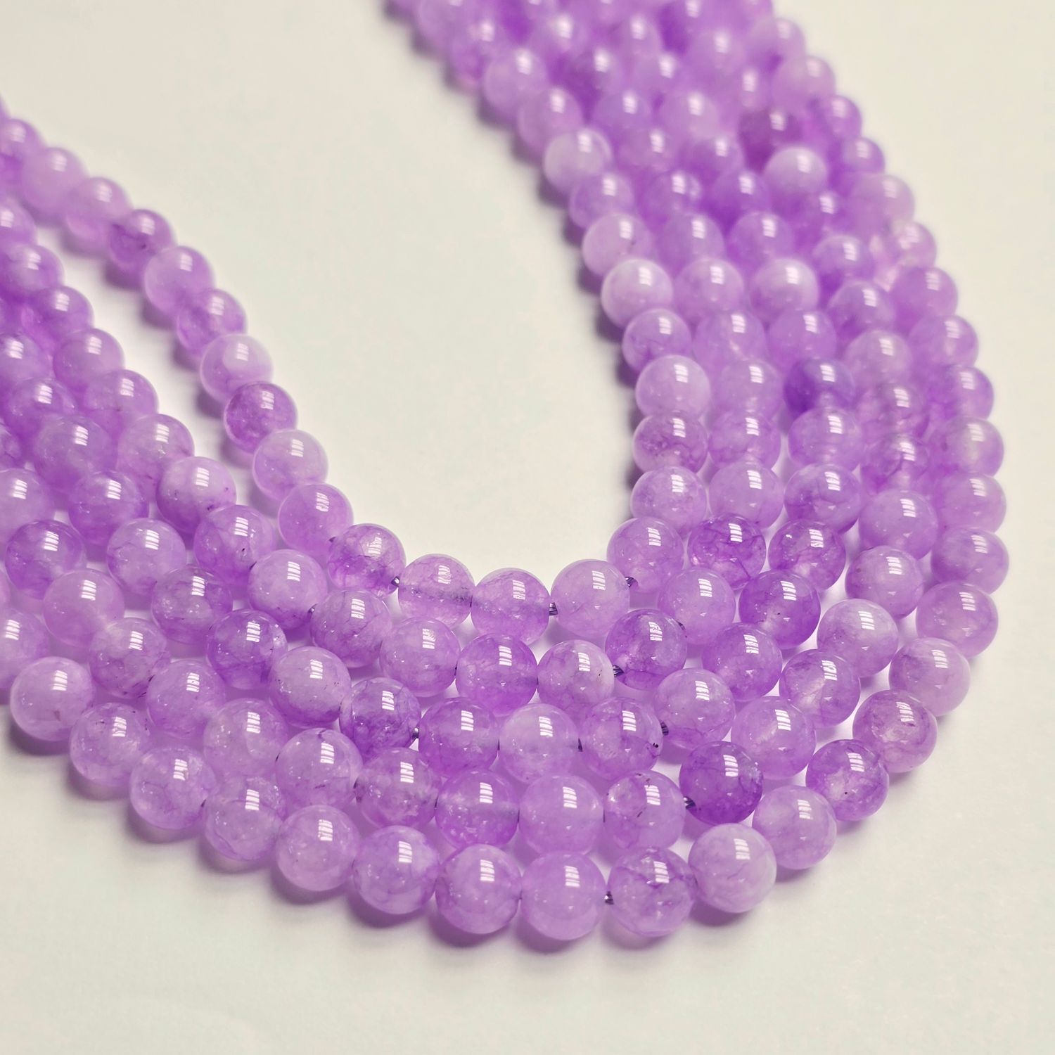6mm Rounds - Purple Chalcedony 6mm Rounds - Purple Chalcedony