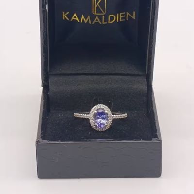 9kt White Gold Tanzanite and Diamond ring - weighs 2.6 grams - size N