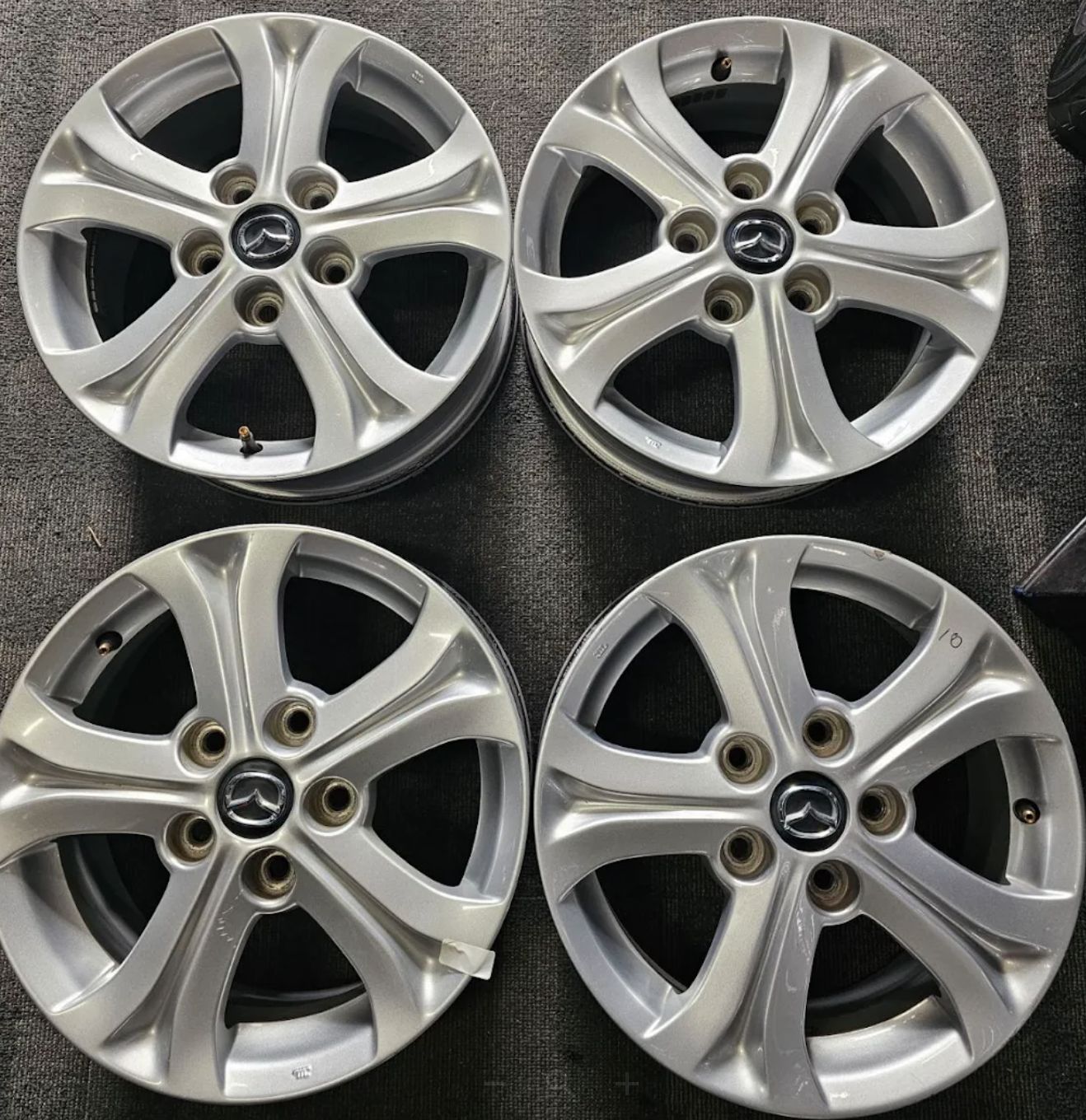 *USED* SET OF 4 GENUINE MAZDA 3 WHEELS 15x6" 5x114.3 ET: 50P SILVER