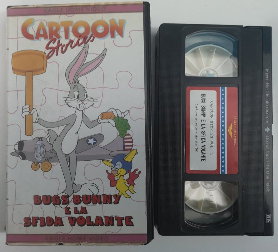 TeknoFilm - VHS – CARTOON SHOW Volume 3 - BUGS BUNNY E LA SFIDA VOLANTE (4 Episodi) (1989) - EAGLE (INEDITO IN DVD) TeknoFilm - VHS – CARTOON SHOW Volume 3 - BUGS BUNNY E LA SFIDA VOLANTE (4 Episodi) (1989) - EAGLE (INEDITO IN DVD)