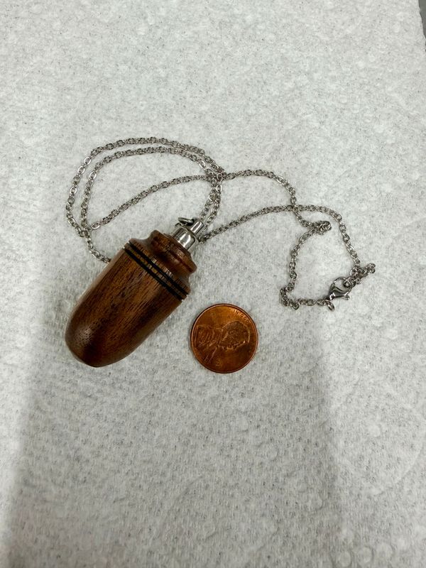 Walnut wood keepsake necklace (2" x 13/16")