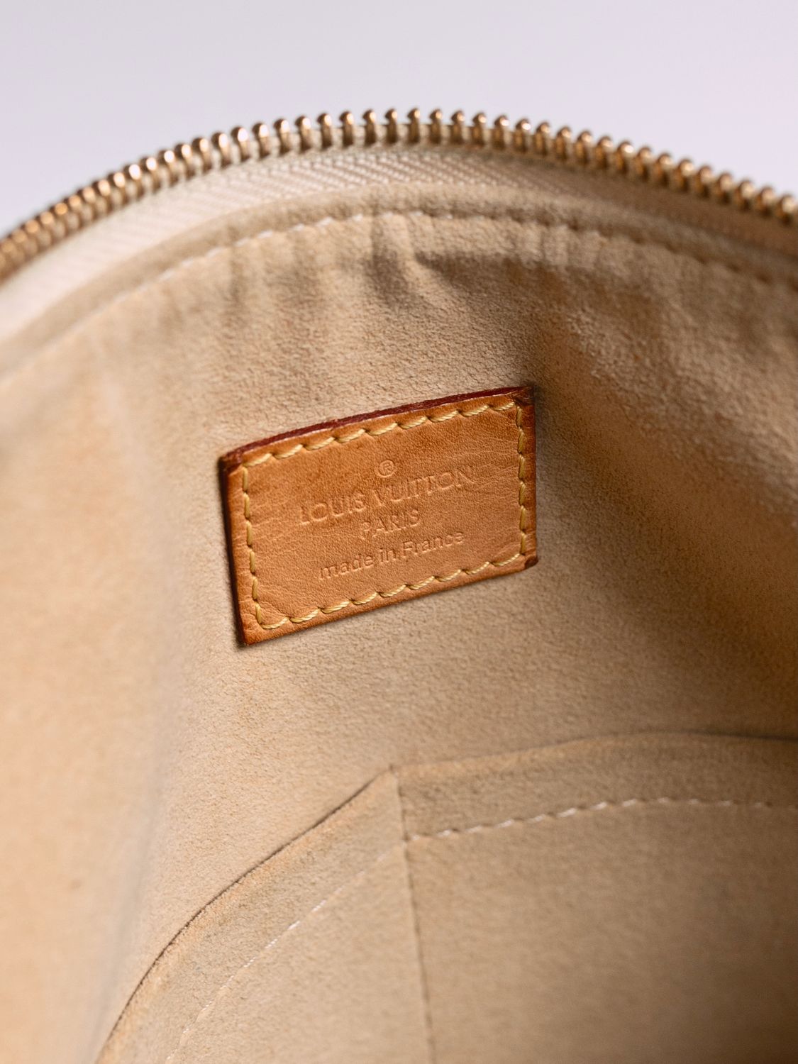 Louis Vuitton Evora MM Bag