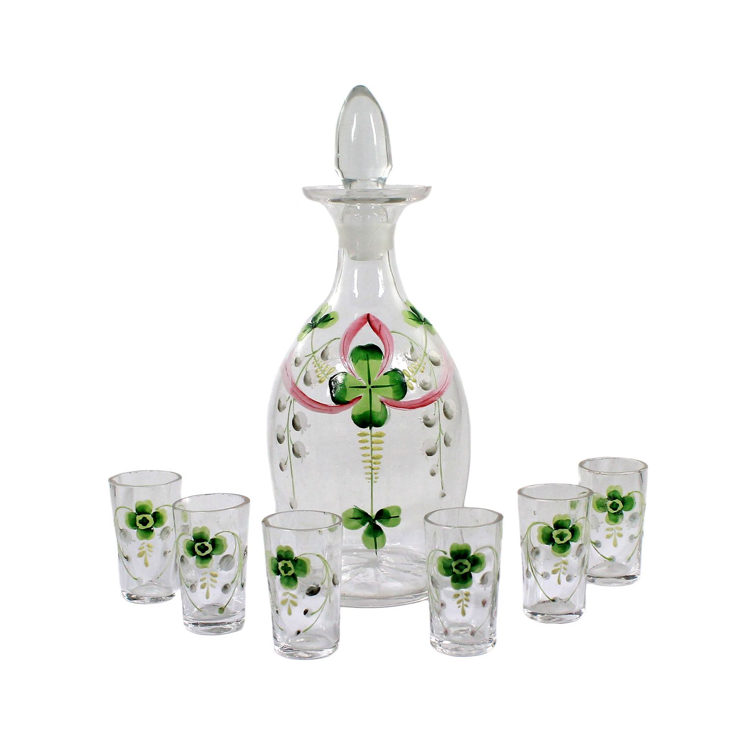 Carafe with 6 shot glasses made of colorless glass with cloverleaf decoration, circa 1900