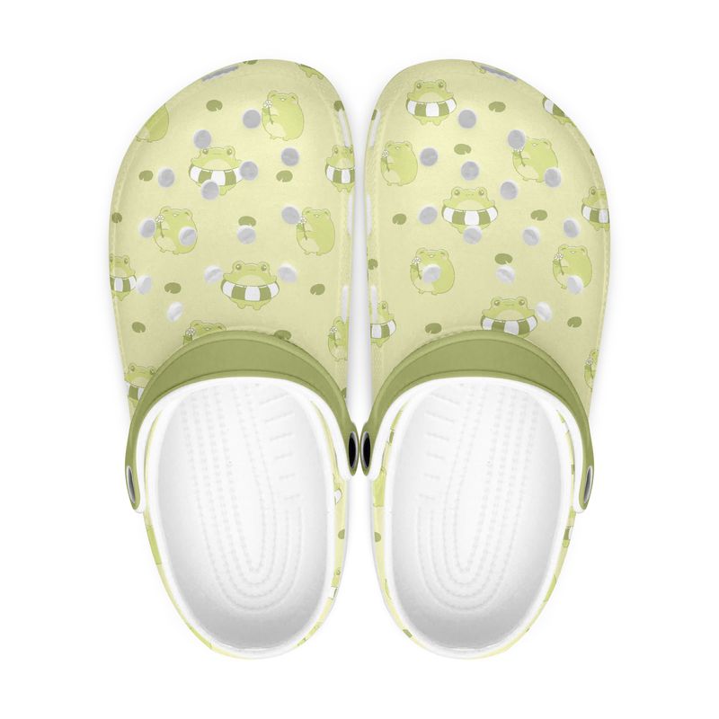 Schattige kikkerklompjes in het groen