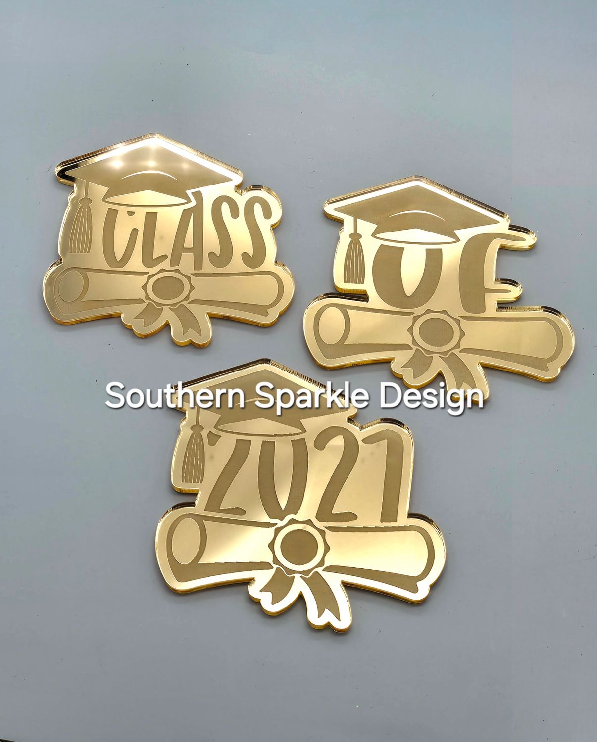 Class Of 27 with grad hat and diploma set