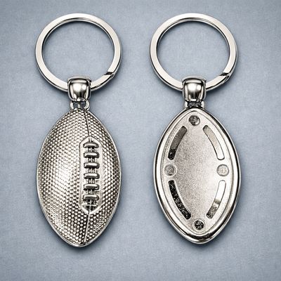 Schlüsselanhänger American Football, ab € 4,00 Metall Schlüsselanhänger American Football silberfarben mit Gravurfläche