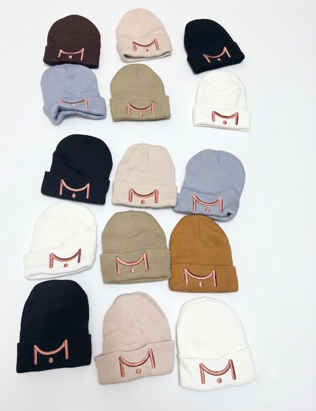 modern bronze logo beanies