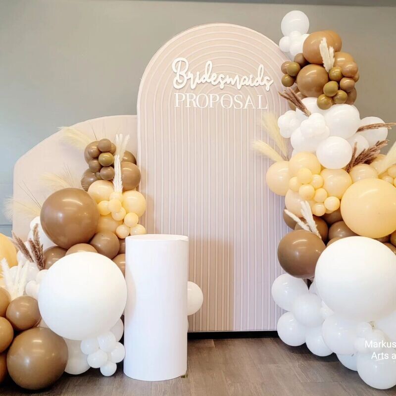 two beige chiara backdrop in boho style white, nude and brown balloon garland with pampas insert for bridal shower or bridesmaids proposal by markuslovidoves arts and crafts airdrie alberta
calgary and area party decorations