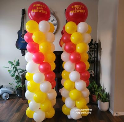 spiral balloon column with stand in yellow, white and red for bubble tea brewers opening day. markuslovidoves arts and crafts airdrie