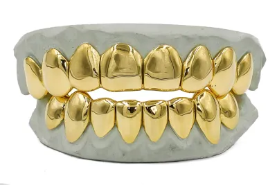 SOLID GOLD PERM CUT GRILLZ