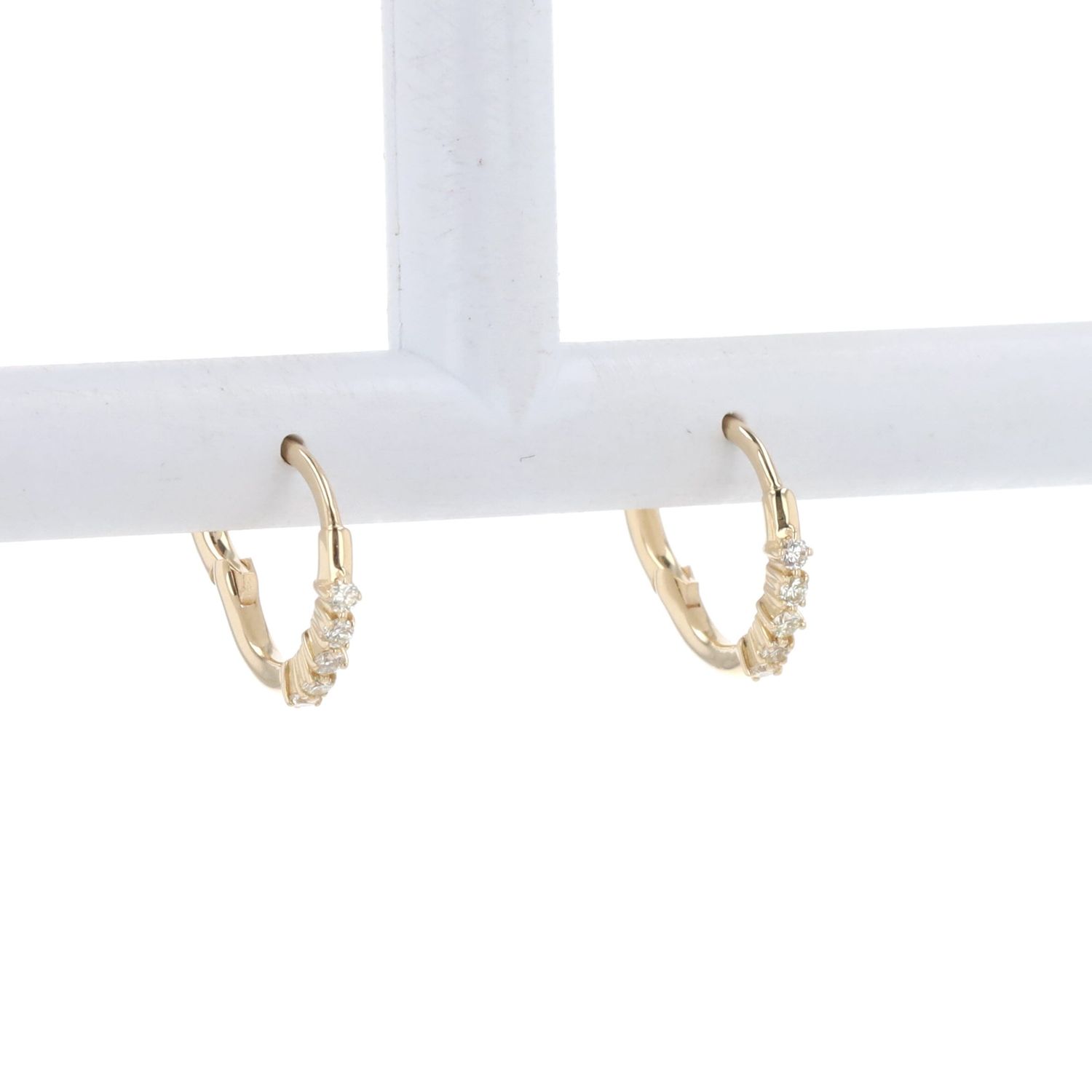 Ladies Diamond Huggies Earrings 10kt YG 1.1gr Natural 0.25cttw ER00218