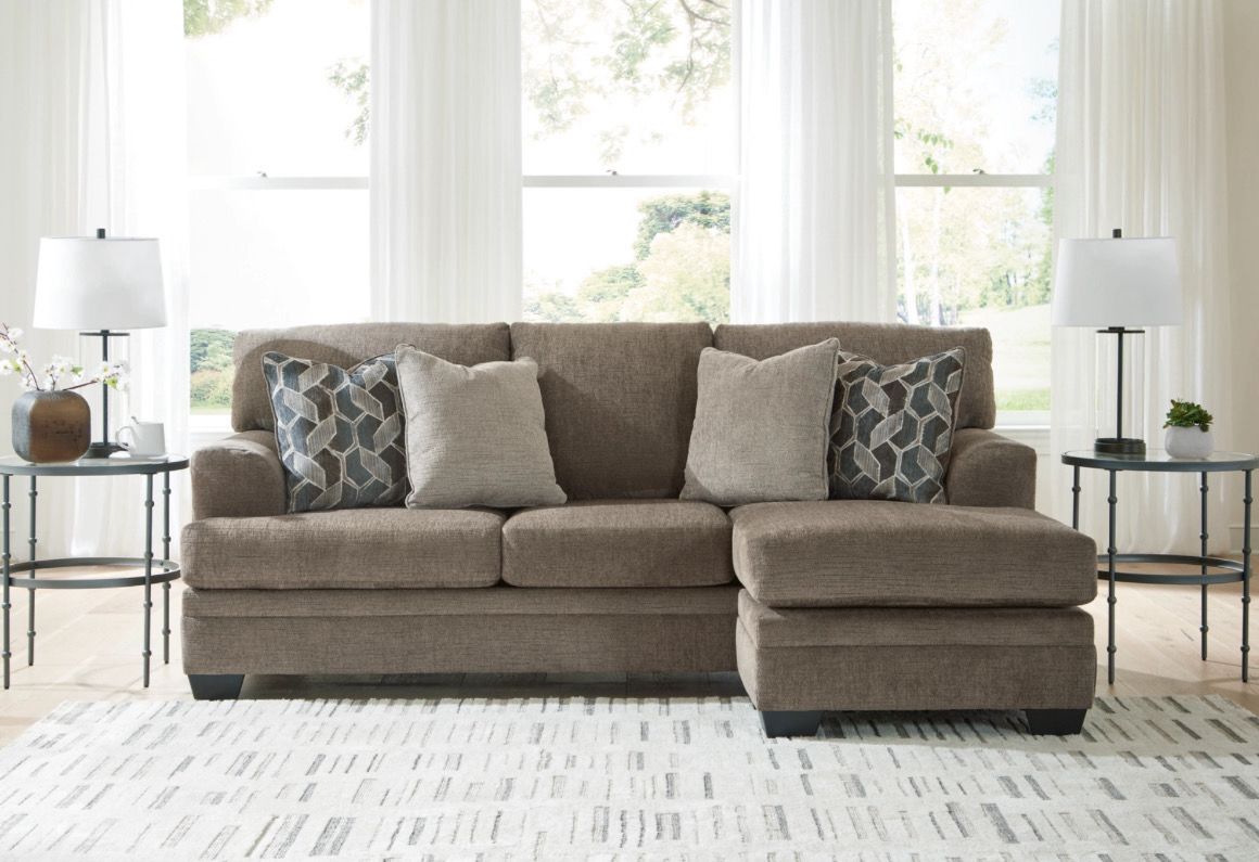 Stonemeade Sofa Chaise Sectional With Throw Pillows By Ashley