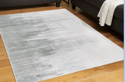 Milset Washable 5' x 7' Rug By Ashley Design