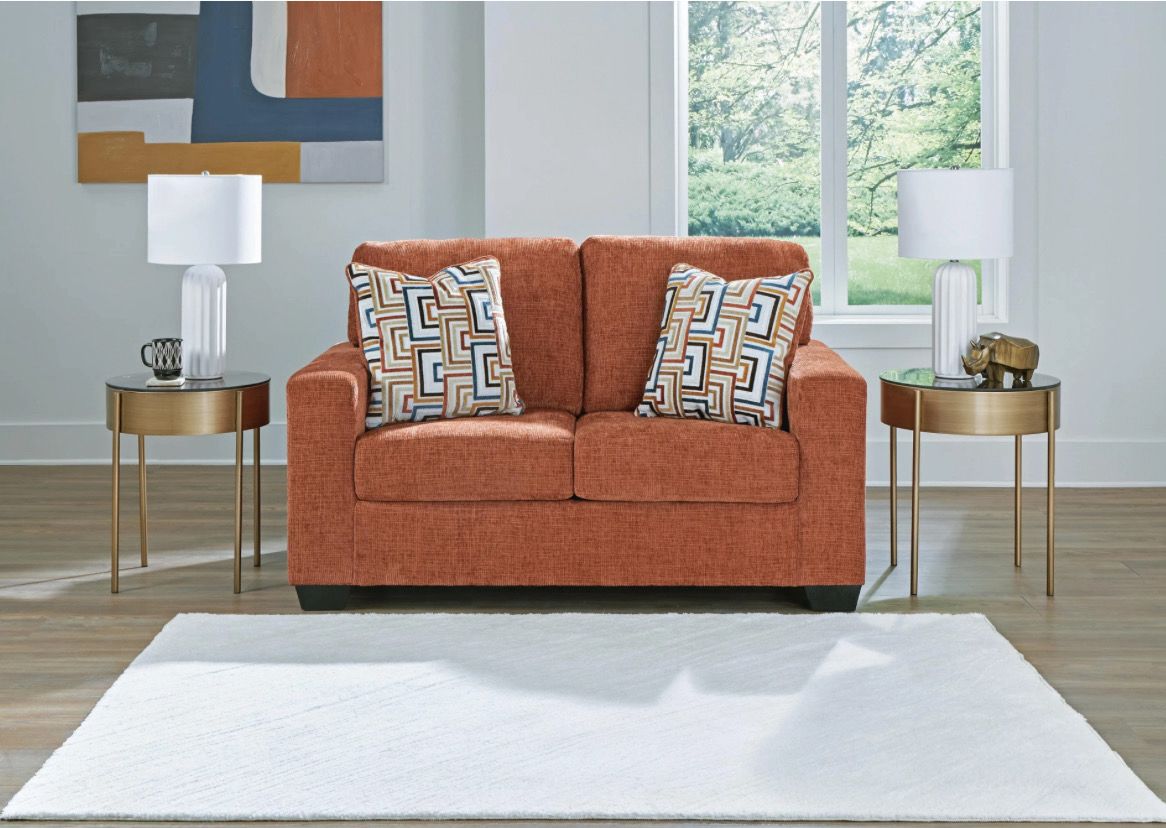 Aviemore Loveseat In Spice By Ashley With Throw Pillows