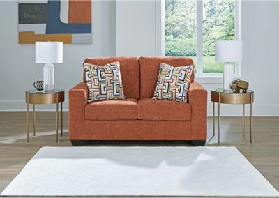 Aviemore Loveseat In Spice By Ashley With Throw Pillows