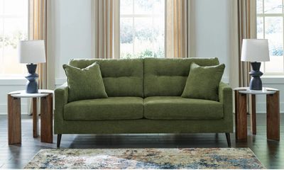 Bixler   sofa Midcentury style by Ashley with throw pillows