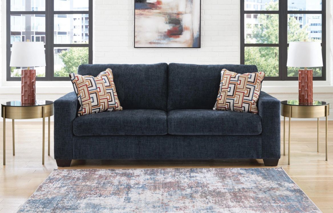 Aviemore Sofa Modern In Blue By Ashley With Throw Pillows