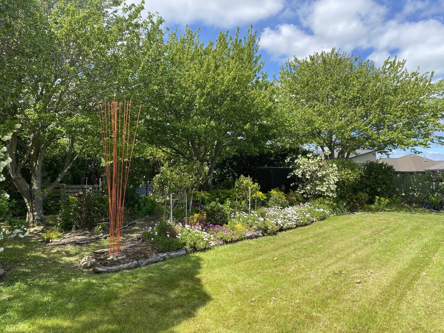 15 x 3m tall Windsticks (no stones) - colour Orange.  
Kinetic Wind Sculpture and Bird Feeder