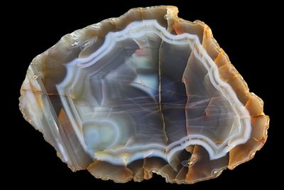 Heavily Fortified Agate, plumy details and water line banding.  Rare