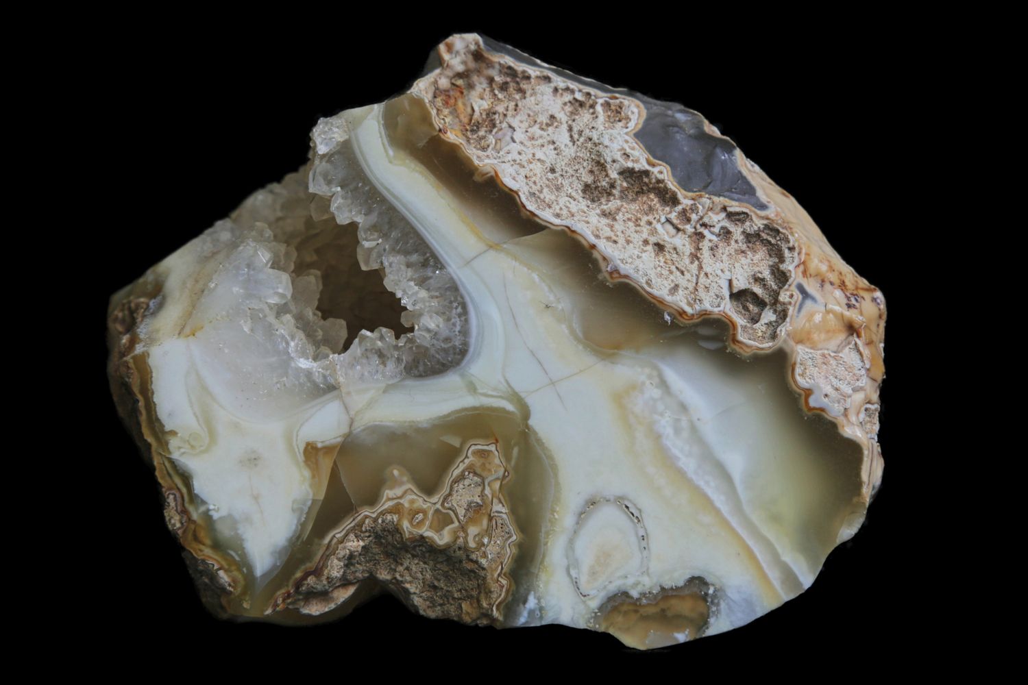 Creamy White broken Agate with a Quartz crystal Geode in it