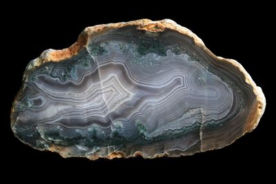 Fortified Agate, green plumes, Parallax (RARE).  Parallax means &quot;the apparent shift in position of the lines when seen from two different points&quot;