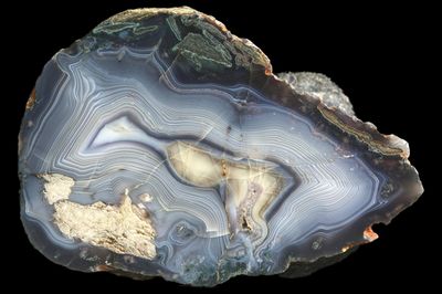 Heavy Fortification Agate, bold lines, Calcite infill, Mineral inclusions around the edge (1.2 kg)