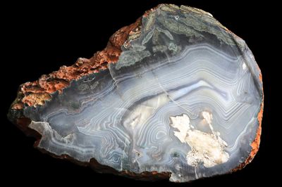 Heavy Fortification Agate, bold lines, Calcite infill, Mineral inclusions around the edge (1.2 kg)