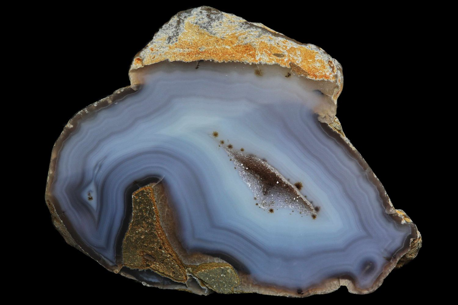 Fortification Agate with Druzy Quartz Geode, Dendrite around the margin of the crystal cavity.