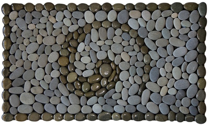 Koru Dark Stonemat featuring a polished koru spiral, a polished stone border, and natural grey stones in a handmade design.