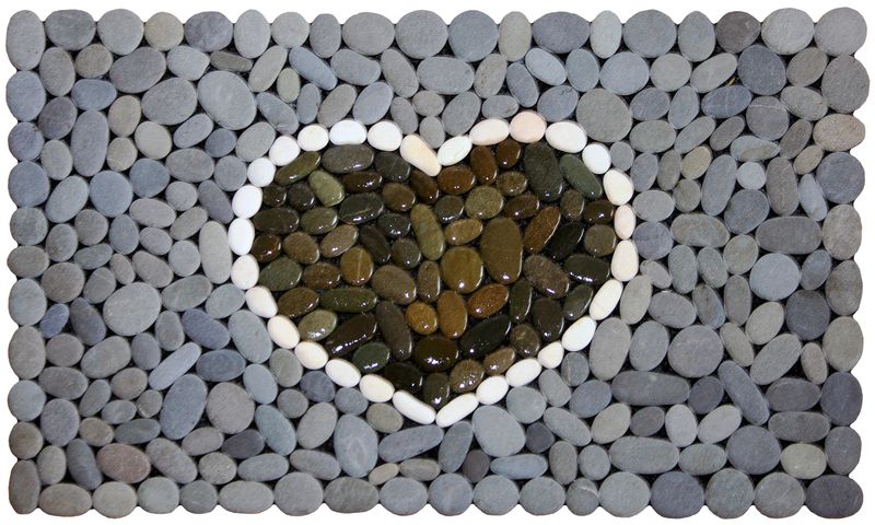 DARK HEART Stonemat featuring a heart outlined in white stones with a dark polished center, surrounded by natural grey stones