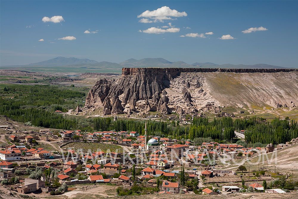 Sileme Plateau in Turkey with a flat hill and houses below