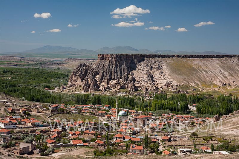 Sileme Plateau in Turkey with a flat hill and houses below