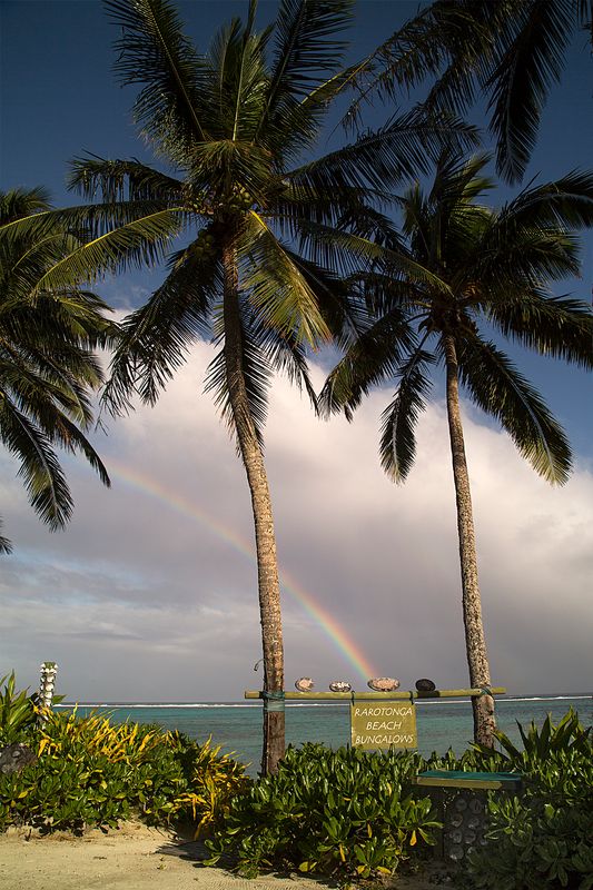 Rainbow over Rarotonga Beach Bungalows with a serene beach view