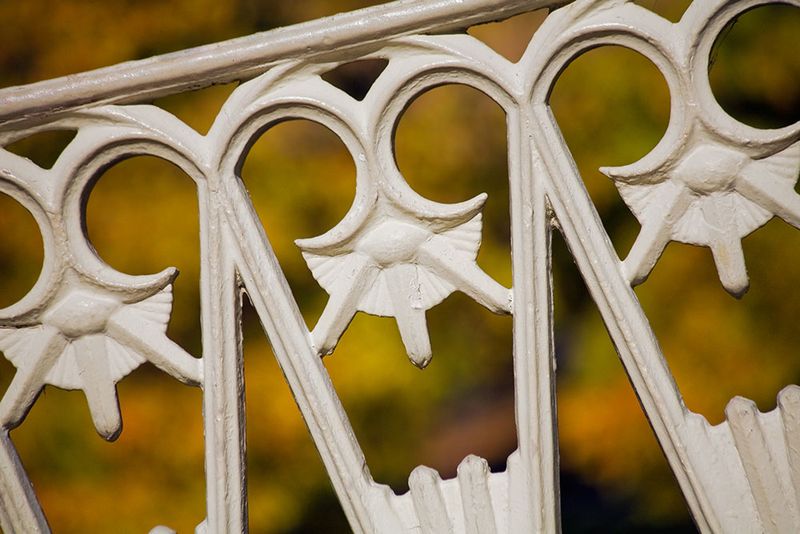 Funny face bridge railing with autumn colors in Christchurch