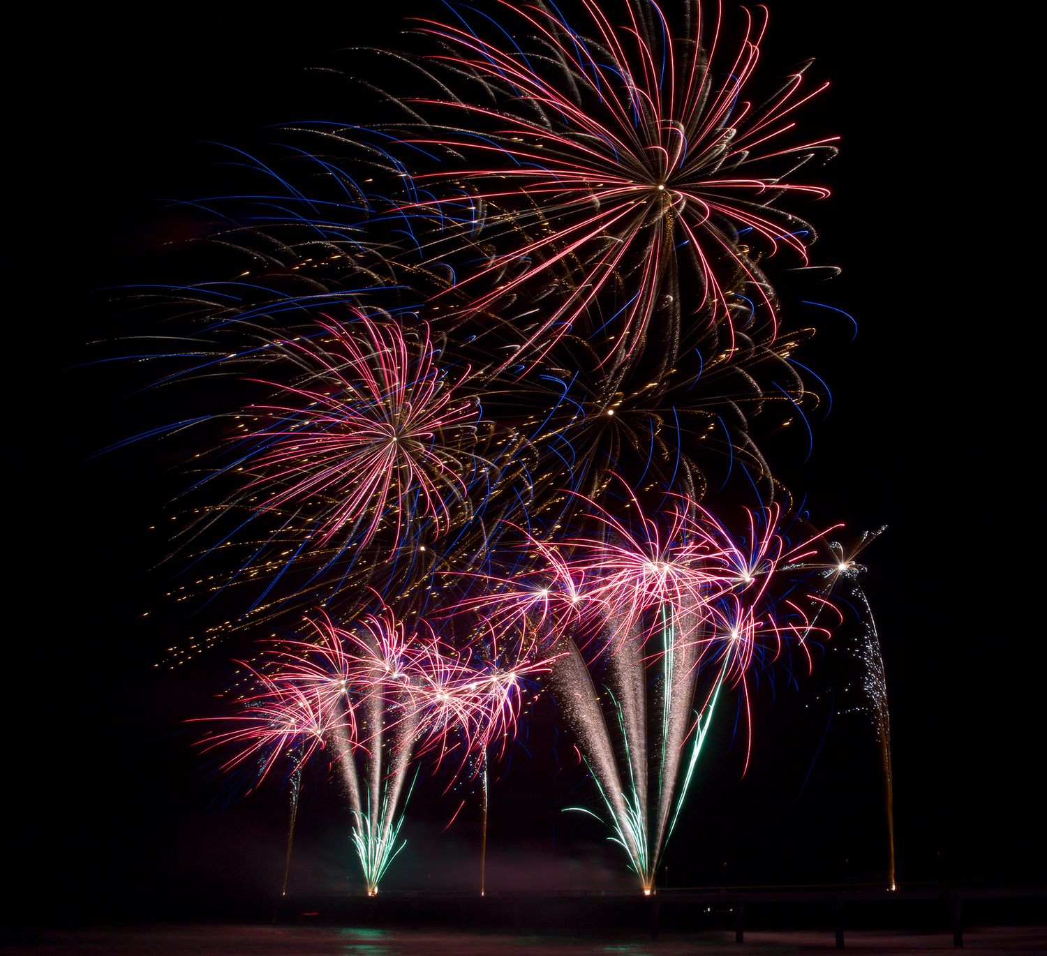 Arch-shaped fireworks at Brighton Pier, Christchurch, New Zealand