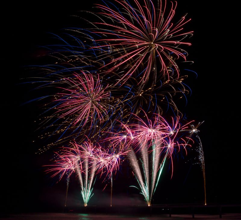 Arch-shaped fireworks at Brighton Pier, Christchurch, New Zealand