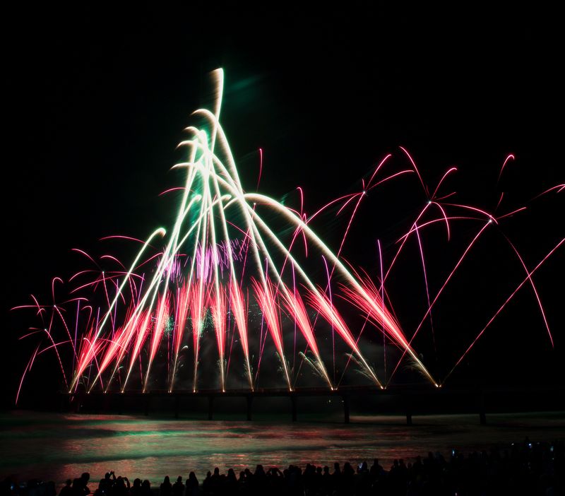 Synchronized V-shaped fireworks at Brighton Beach, Christchurch