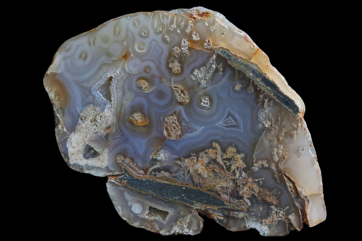 Agate with multiple centres with Mossy inclusions &amp; two small Crystalline Geode in it